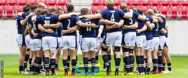 Scotland team huddle during the captain's run in Japan
