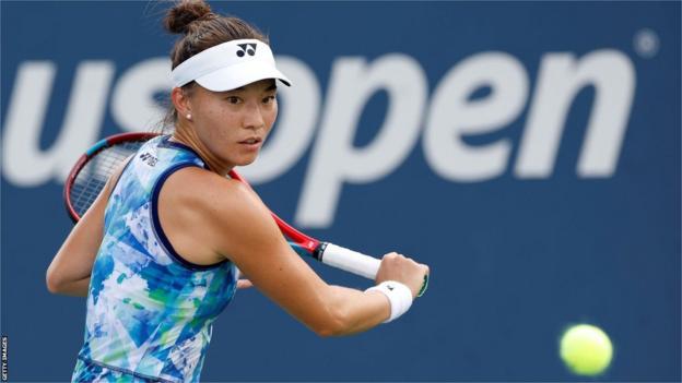 Lily Miyazaki returns a shot  against Belinda Bencic astatine  the US Open