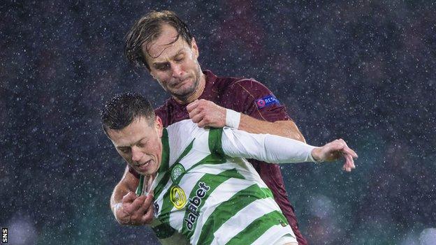 Celtic's Callum McGregor holds off Cluj's Damjan Djokovic