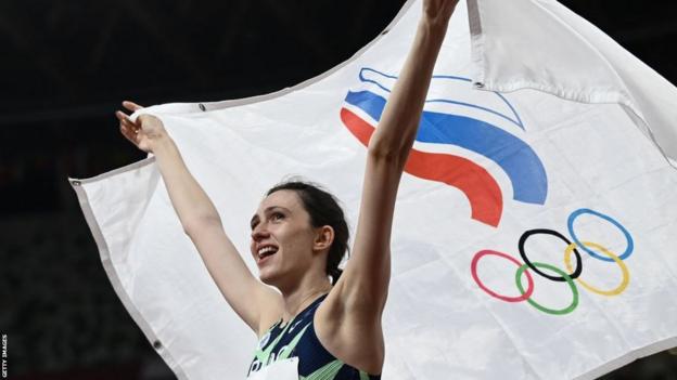 Russia's Mariya Lasitskene celebrates after winning women's high jump gold at Tokyo 2020