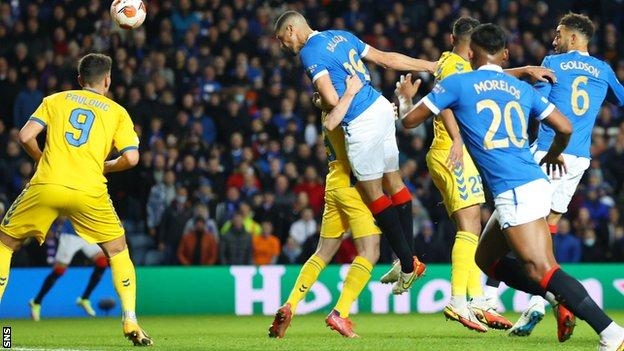 Leon Balogun's header sent Rangers on their way to a first win in Group A