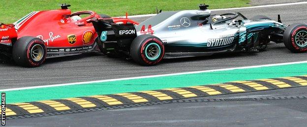 Lewis Hamilton and Sebastian Vettel make contact on the first lap of the Italian GP in Monza