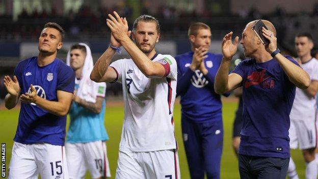 USA players and staff celebrate reaching the World Cup finals