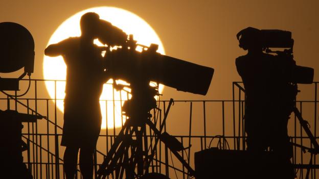 Cameramen film a match at the 2019 Africa Cup of Nations in Egypt