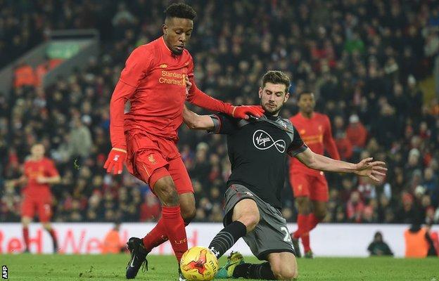 Divock Origi went down under the challenge of Jack Stephens late on but referee Ben Atkinson gave no penalty