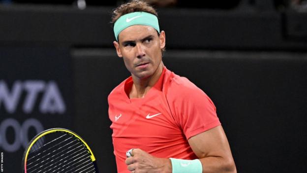 Rafael Nadal celebrates after winning a point against Dominic Thiem at the Brisbane International