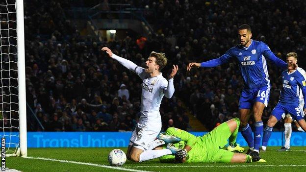 Patrick Bamford scored from the spot for Leeds after being brought down by Cardiff keeper Neil Etheridge