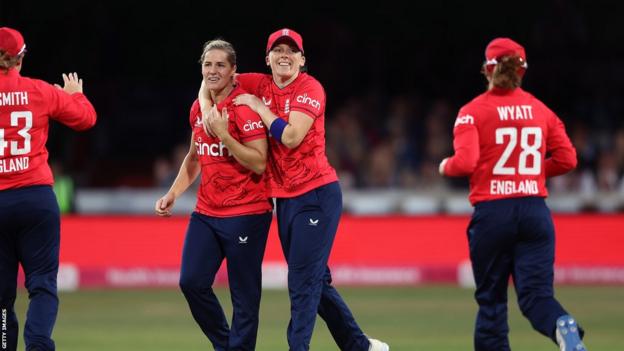 Heather Knight and Katherine Brunt celebrating a wicket