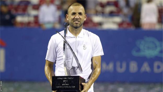 Dan Evans holds the Citi Open trophy