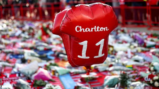 Balloons at a scarf stall in honour of Sir Bobby Charlton ahead of the Premier League match between Manchester United and Manchester City at Old Trafford