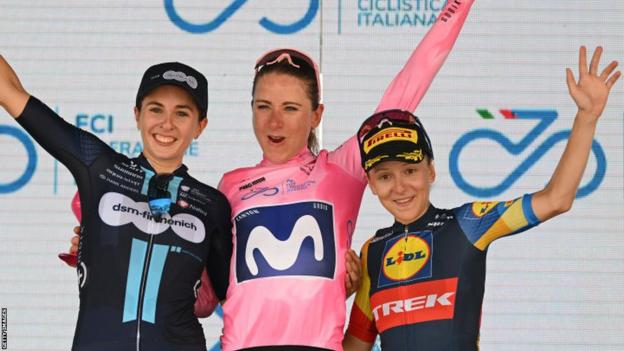 Runner-up Juliette Labous, race winner Annemiek van Vleuten and third-placed Gaia Realini on the podium after the 2023 Giro d'Italia Donne