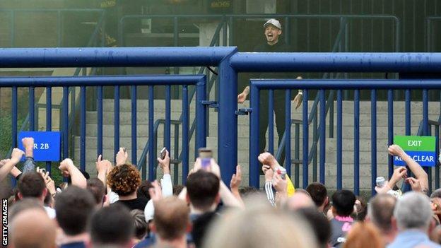 Kalvin Phillips celebrates Leeds earning promotion back to the Premier League in July 2020