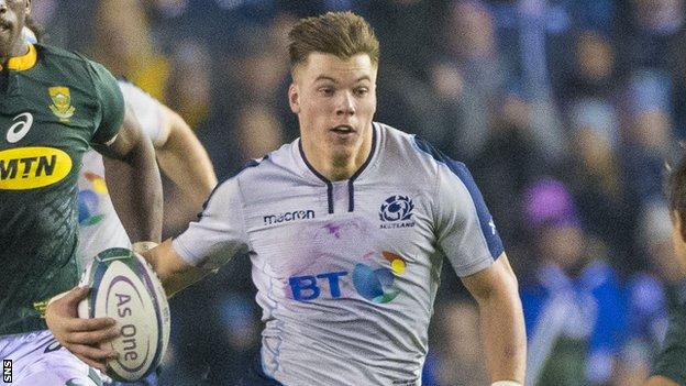 Huw Jones runs with the ball for Scotland against South Africa