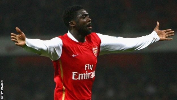 Kolo Toure celebrates while playing for Arsenal