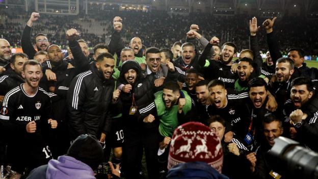 Players from Qarabag celebrate knocking out Sporting Braga in the Europa League