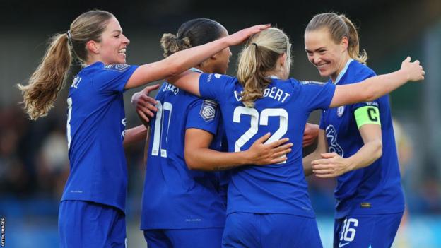 Chelsea players celebrate after Erin Cuthbert scores against Leicester City at Kingsmeadow