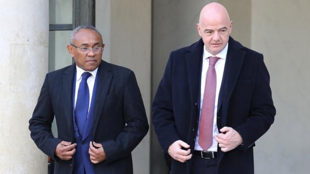Former Confederation of African Football president Ahmad and Fifa president Gianni Infantino