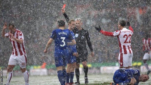 Everton play Stoke during heavy snow in March 2018