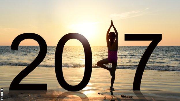 Yoga tree pose in the sunset with 2017 feature