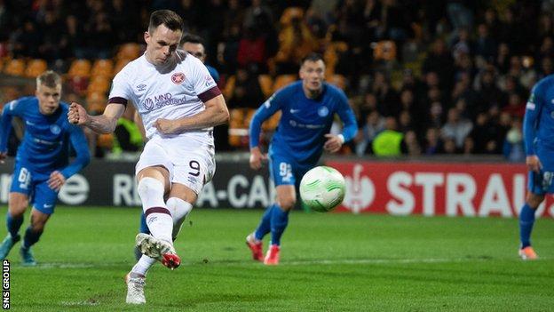 Lawrence Shankland scores from the spot for Hearts