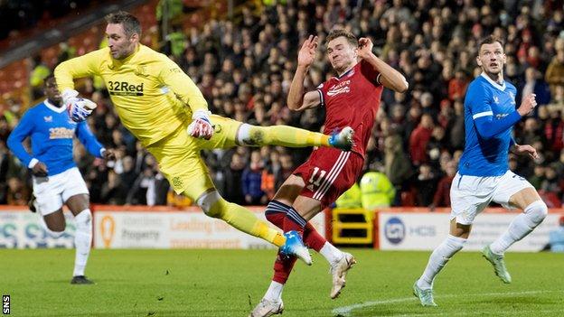 Rangers opened the scoring seconds after Allan McGregor's clash with Aberdeen forward Ryan Hedges