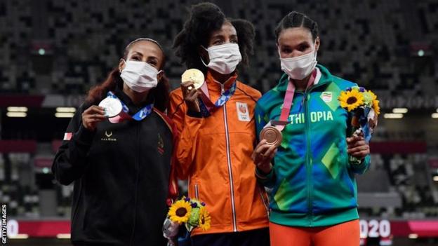 Bahrain's Kalkidan Gezahegne (left), Netherlands Sifan Hassan (centre) and Ethiopia's Letesenbet Gidey on the podium for the women's 10,000m at the Tokyo Olympics