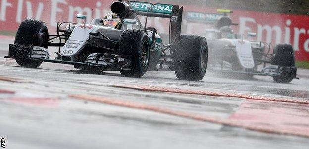 Lewis Hamilton and Nico Rosberg during Hungarian GP qualifying
