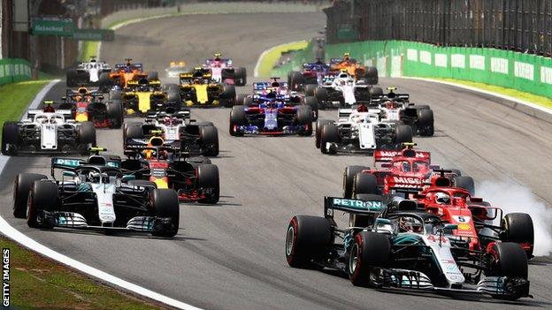 Formula 1 cars race at the start of the Brazilian Grand Prix in 2018