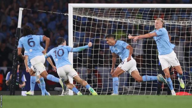 Rodri celebrates scoring