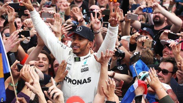 Lewis Hamilton salutes his fans