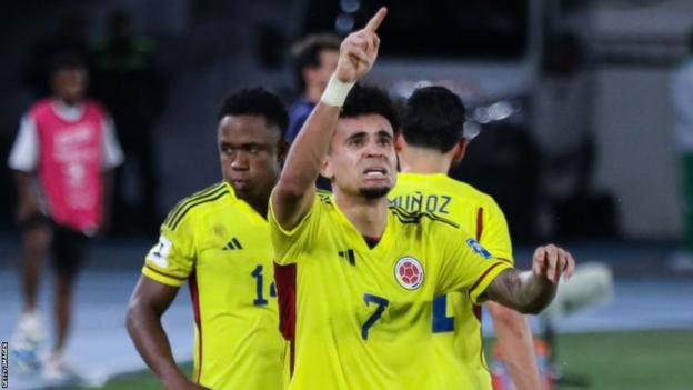 Luis Diaz celebrates scoring for Colombia