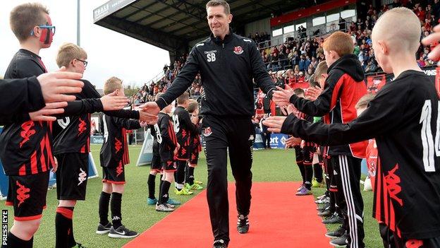 Stephen Baxter gets a guard of honour at Seaview after Crusaders won the Premiership title