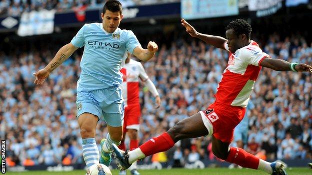 Sergio Aguero scores the title-winning goal against QPR