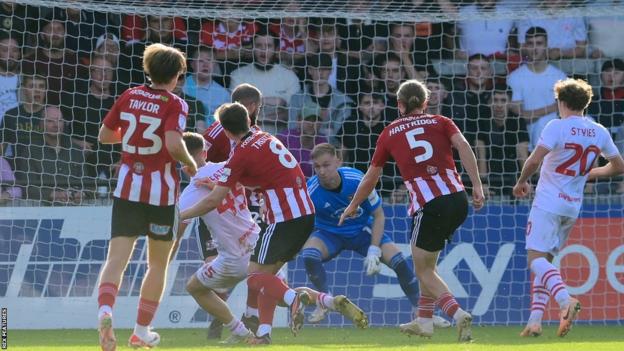 John McAtee scores a late winner for Barnsley at Exeter City