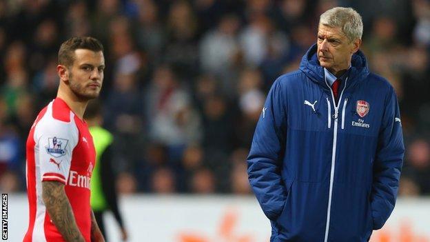 Arsenal manager Arsene Wenger (right) and Jack Wilshere