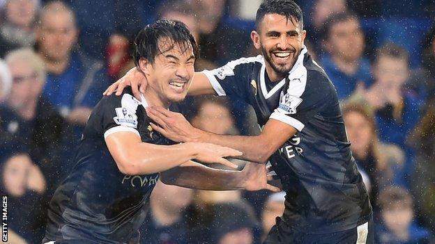 Shinji Okazaki and Riyad Mahrez celebrate Leicester's third goal