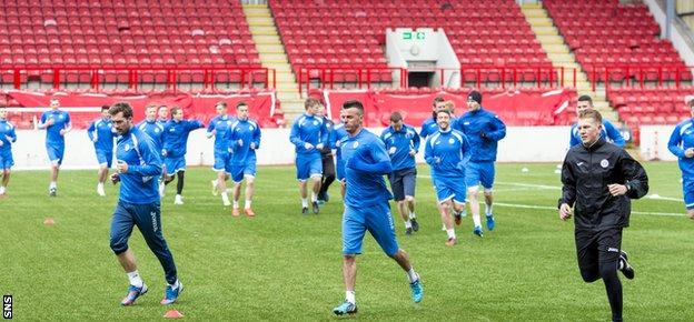 Queen of the South players training at Broadwood