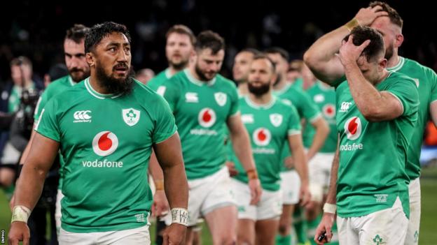 Bundee Aki and Hugo Keenan dejected at full-time