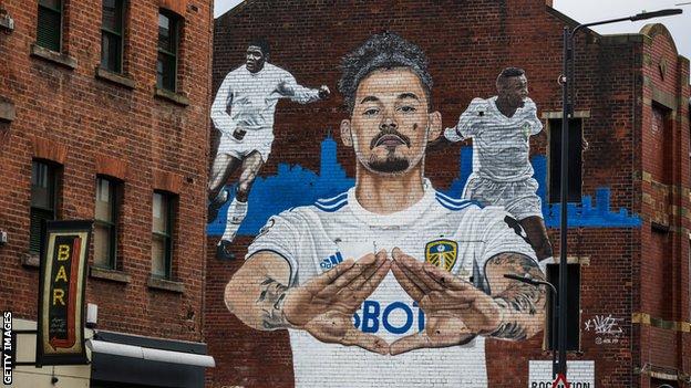 Mural featuring Kalvin Phillips (centre), Albert Johanneson (left) and Lucas Radebe (right) in Leeds city centre