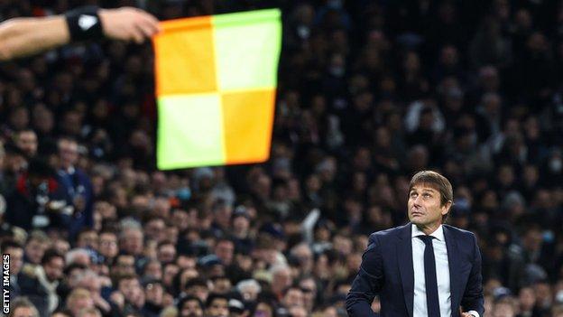 Antonio Conte looks up at an offside flag