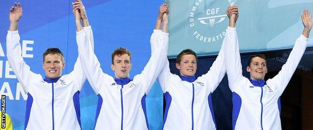 The Scotland team pose during the medal ceremony for the Men's 4 x 200m freestyle relay final