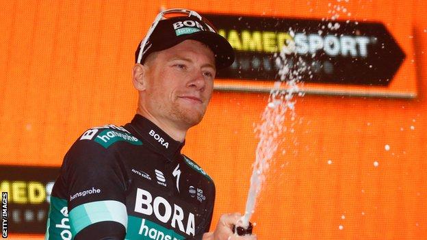 Sam Bennett celebrates winning stage 12