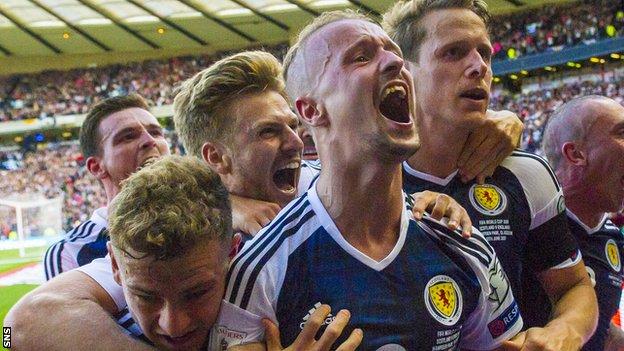 Scotland celebrate a Leigh Griffiths goal against England in their World Cup qualifier in June 2017