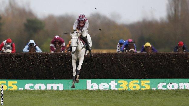 Smad Place, ridden by Wayne Hutchinson, romping to victory at the Hennessy Gold Cup