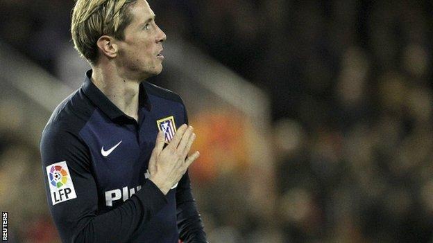 Fernando Torres celebrates his goal for Atletico Madrid against Valencia