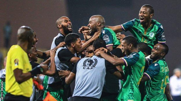 Comoros celebrate a goal against Ghana