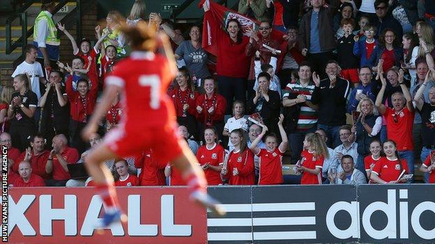 Tash Harding celebrates in front of crowd