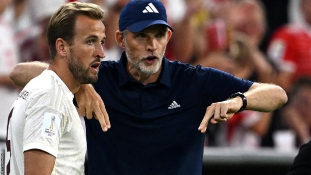 Harry Kane gets instructions from his new manager Thomas Tuchel