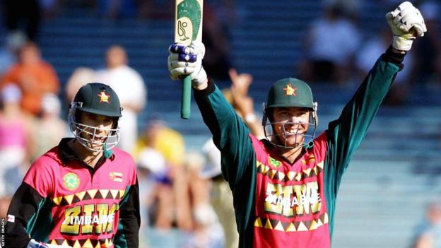 Brian Murphy and Heath Streak celebrate after Zimbabwe win a one-day international against New Zealand in Auckland in 2001