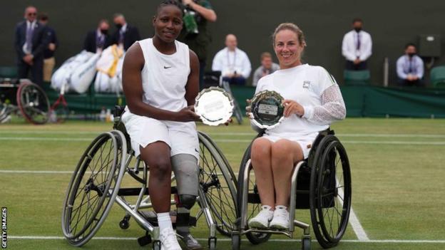 Wheelchair tennis players Kgothatso Montjane of South Africa (left) and her British doubles partner Lucy Shuker with their Wimbledon runners-up trophies
